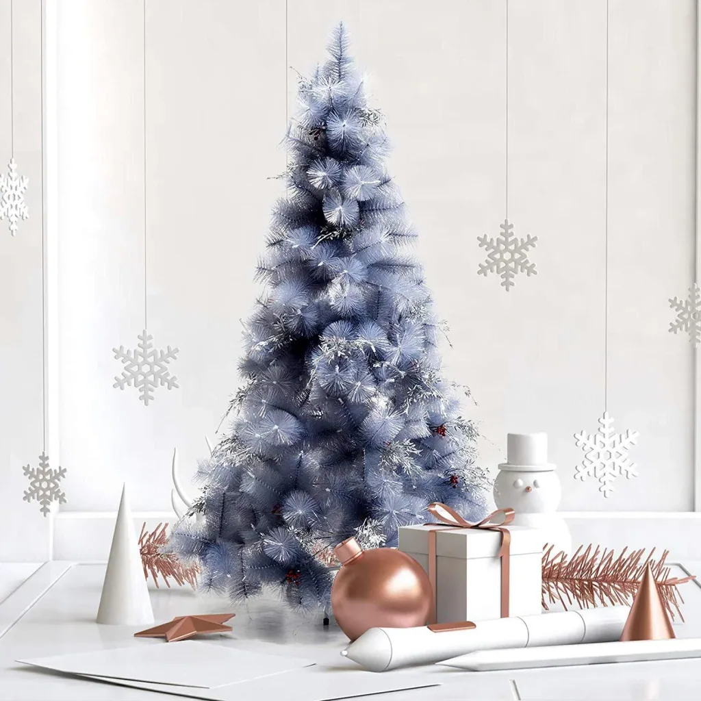 Artificial Christmas tree with silver branches and red berries
