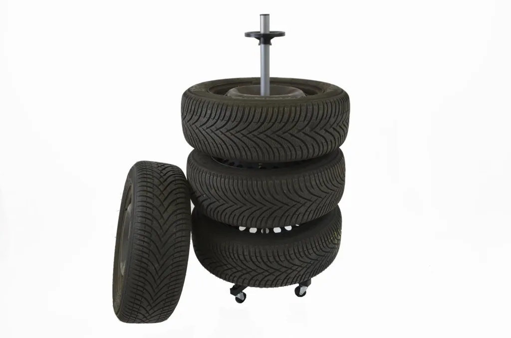 Rim and tire holder with rollers