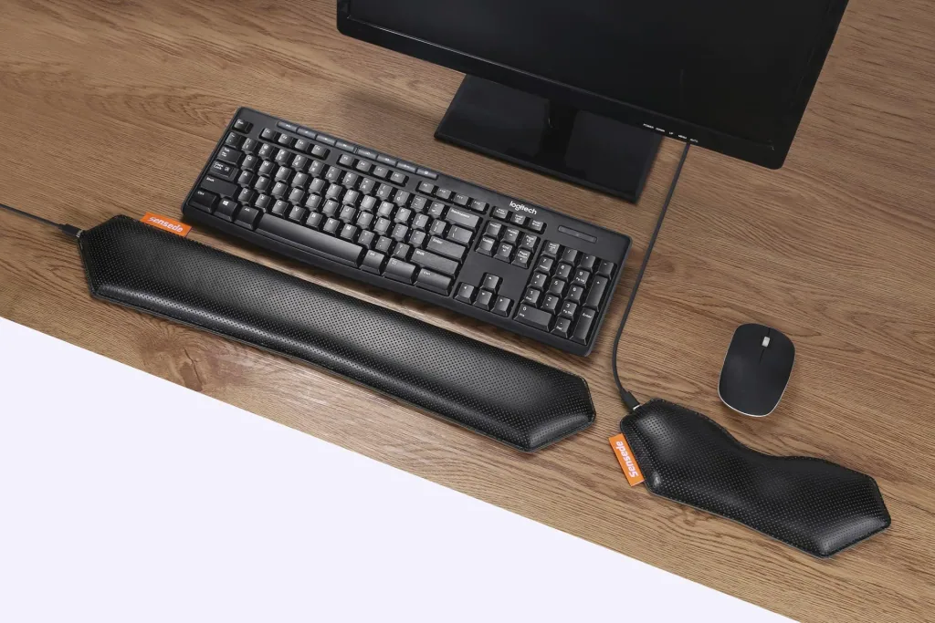 Heated ergonomic keyboard wrist rest