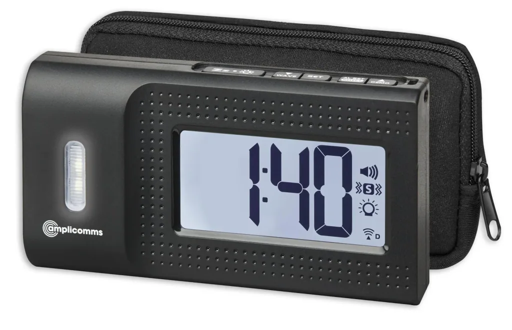Travel alarm clock with vibrating alarm