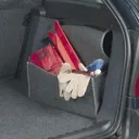 Grey trunk bag with practical carrying handle.