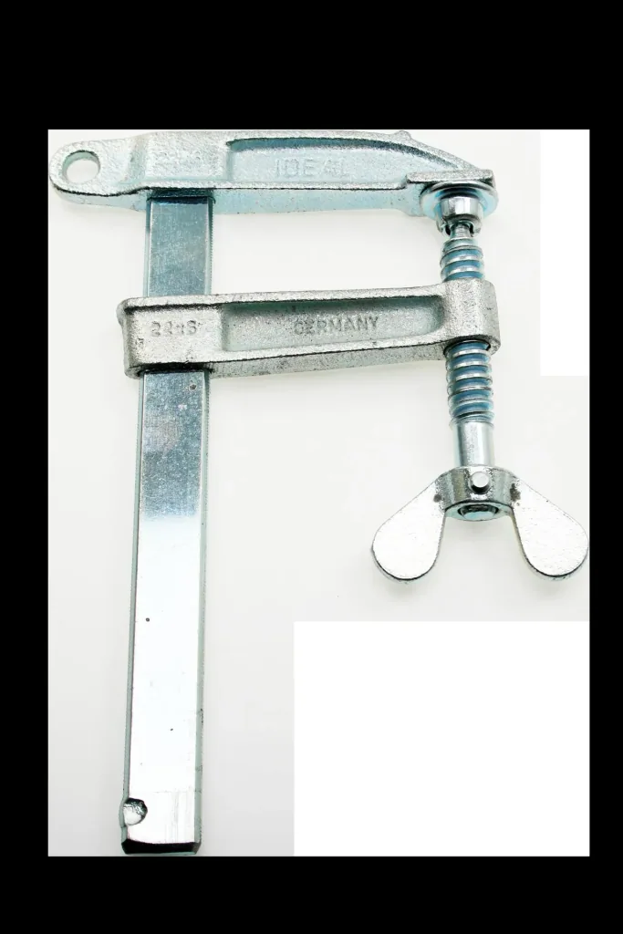 Pole clamp with wing screw
