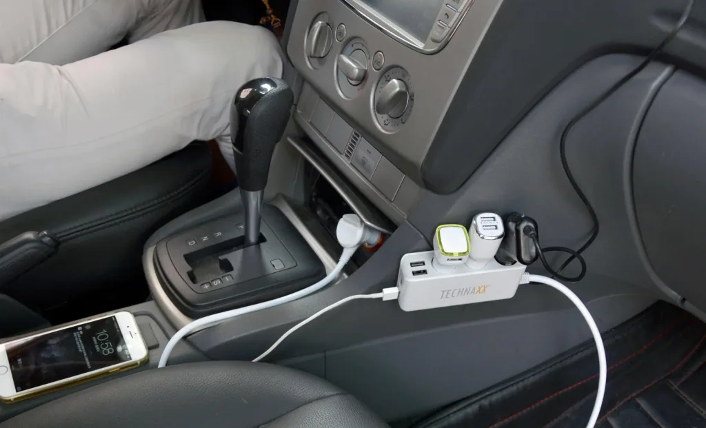 Universal car charger with 4 USB ports and 3-way car distributor