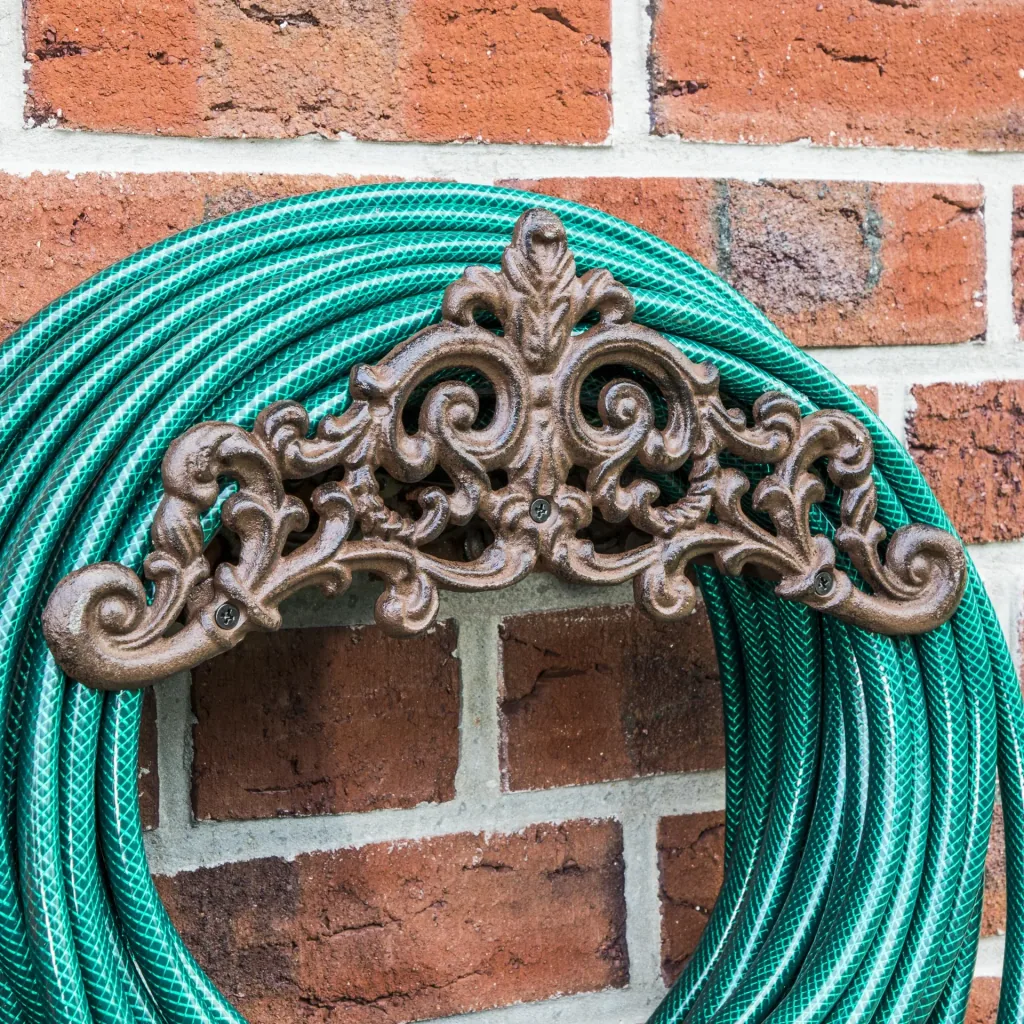 Garden hose holder, cast iron, antique look