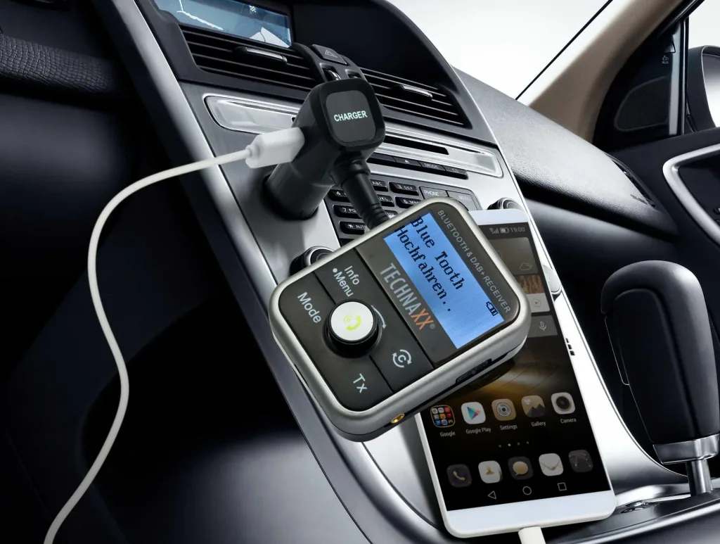 DAB+ and FM Bluetooth transmitter with hands-free function, charging function, radio and MP3 player