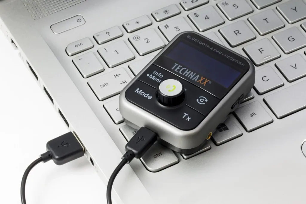 DAB+ and FM Bluetooth transmitter with hands-free function, charging function, radio and MP3 player