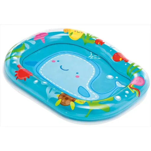 Baby swimming with whale print
