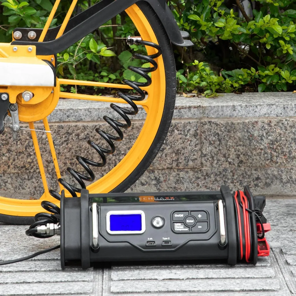 Battery charger with compressor