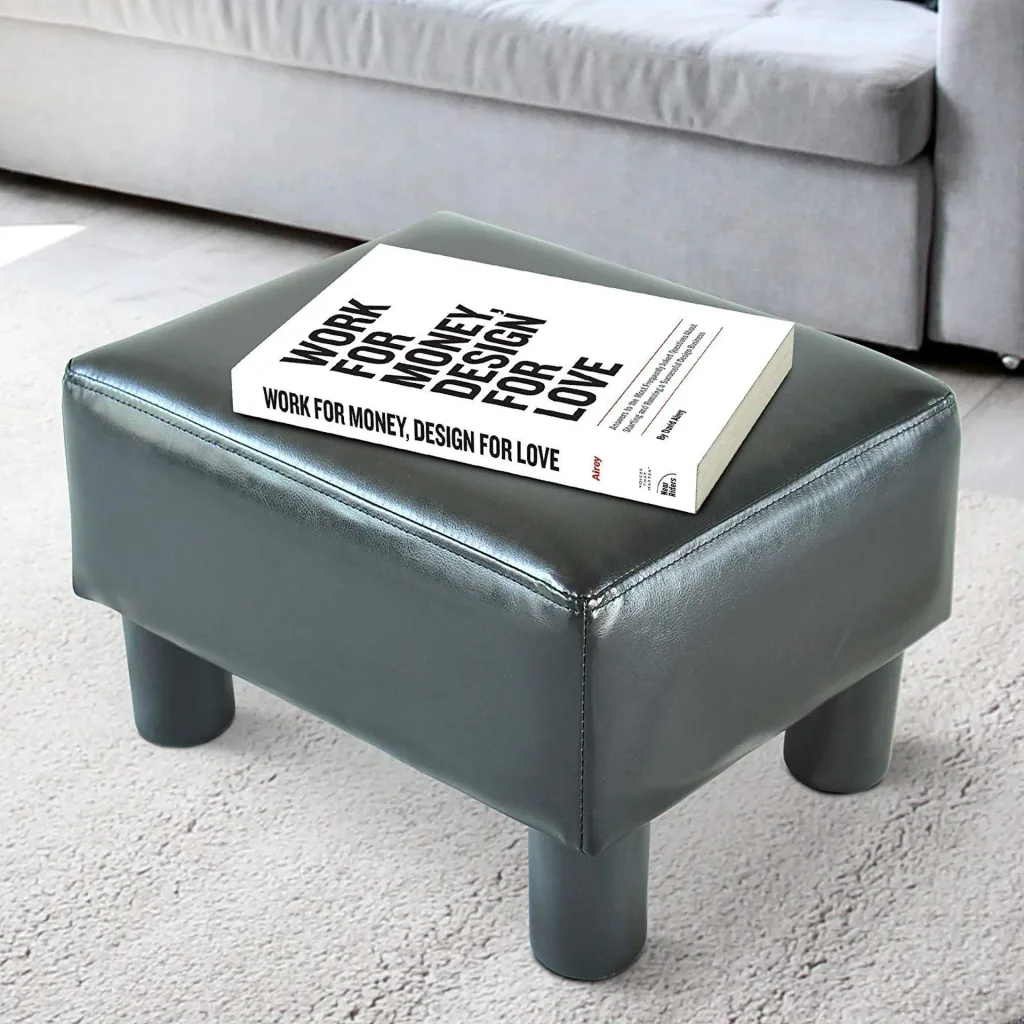 Footstool bench made of black imitation leather