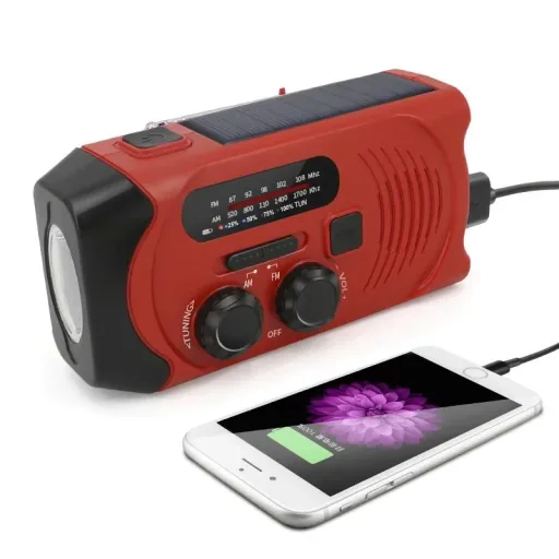 Portable solar crank radio with flashlight