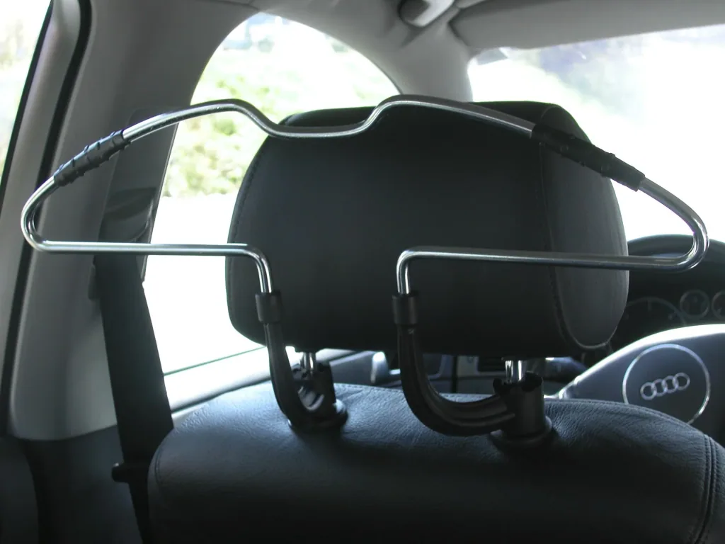 Car coat hanger for headrest