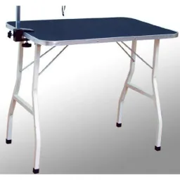 Dog grooming table with holder and rubberized work surface