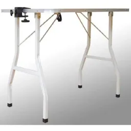 Dog grooming table with holder and rubberized work surface